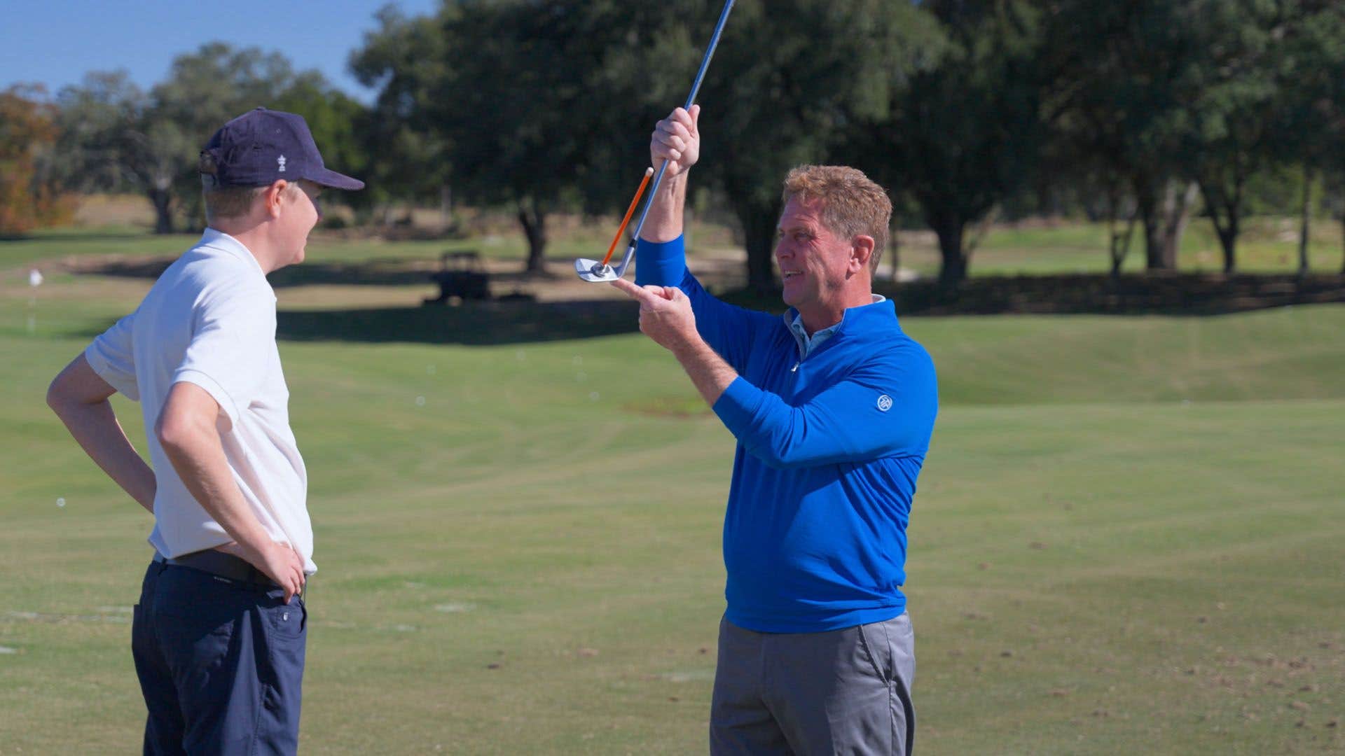 Why is shaft lean so important for solid ball-striking?